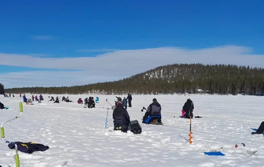 Ice Fishing Trip at Seipäjärvi – in an Authentic Village Setting