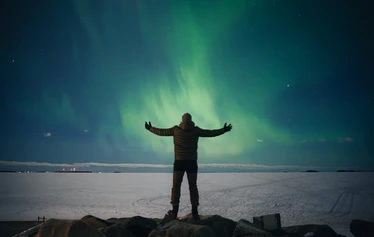 Northern Lights over the frozen sea in Oulu