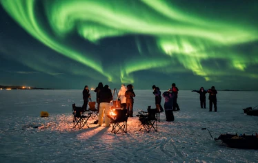Northern Lights over the frozen sea in Oulu