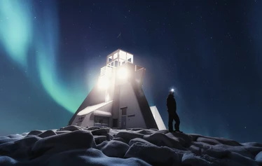 Northern Lights over the frozen sea in Oulu