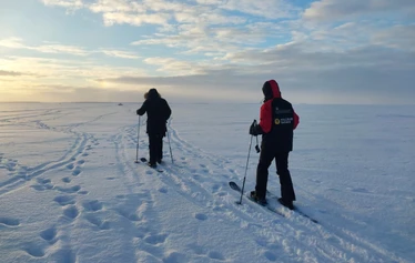 Snowshoeing on the frozen sea in Oulu