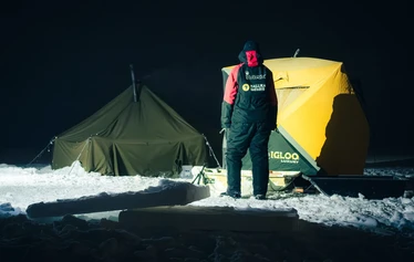 Wood-heated tent sauna on the frozen sea in Oulu