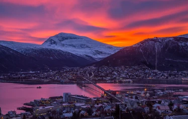 Tromso City in the colors of the Polar Night. Photo © Yngve Olsen / Visit Norway