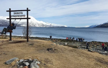 The village of Skibotn is on the shore of Lyngenfjord, 50 km / 31 miles from Kilpisjärvi.