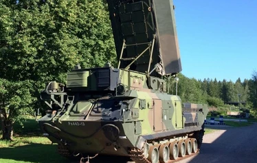 BUK system microwave transmitter Buk-M1-2 SAM - This kind of radio wave transmitter acts like a powerful lamp pointing to any aircraft above. Radiosignals that are bouncing back are followed by the flying missile and it takes less than 10 second from ignition to explode beside the aircraft.