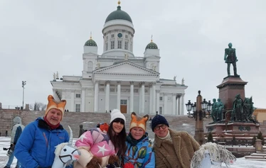 Riding a hobby horse in town of Porvoo during christmas market