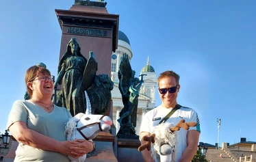 Riding a hobby horse in town of Porvoo during christmas market