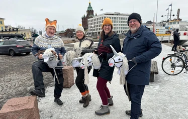 Riding a hobby horse in town of Porvoo during christmas market