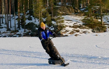 Winter adventure by snowscooters in lake Saimaa - Winter adventure by snowscooters in lake Saimaa is big fun. Snow surfing on the ice the lake on a sunny winter day is amazing experience in Sahanlahti Resort in Puumala