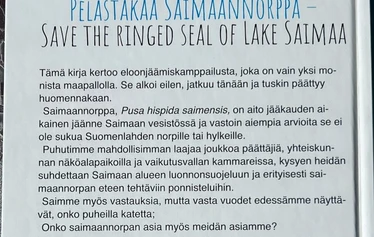Saimaannorppa ja suojelusenkelit kirja - Saimaannorppa ja suojelusenkelit kirja kertoo Saimaannorpan suojelijoista ja saimaannorpasta. Kirja julkaistiin 16.8.2025