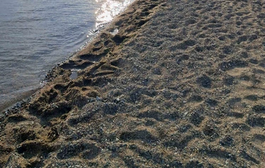 Mantsin matalikko Puruvedellä Pohjois-Karjalassa - Mantsin matalikko on keskellä kirkasvetistä Puruvettä ja lähimpään rantaan on 2 km. Matalikon vieressä on 45-60 metrin syvänne. Kesälahti, Kitee. Kuva 2025.