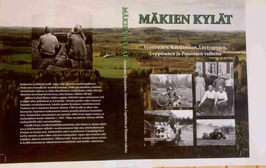 Mäkien kylät-kirjan kannet.  Kuva: Ensio Pietikäinen.