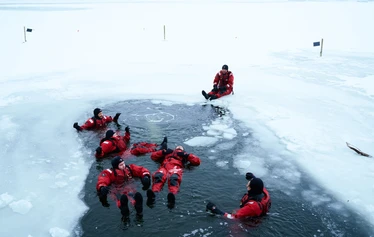 Ice floating in Helsinki - Ice floating is an experience that you wont forget! We dress up to dry suits and warm under layers and relax in the Baltic Sea!