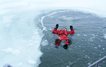 Ice floating in Helsinki - Ice floating is an experience that you wont forget! We dress up to dry suits and warm under layers and relax in the Baltic Sea!