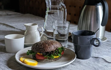 Coffee and a stuffed bread roll for breakfast