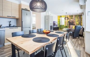 Living Room and Kitchen - At the Malmi cottage in the village of Jyrkkä, Sonkajärvi, the living room and kitchen form a bright, open-plan space.