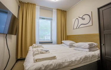 Sawo Hostel Iisalmi - Majoitu hotellitasoisissa huoneissamme.