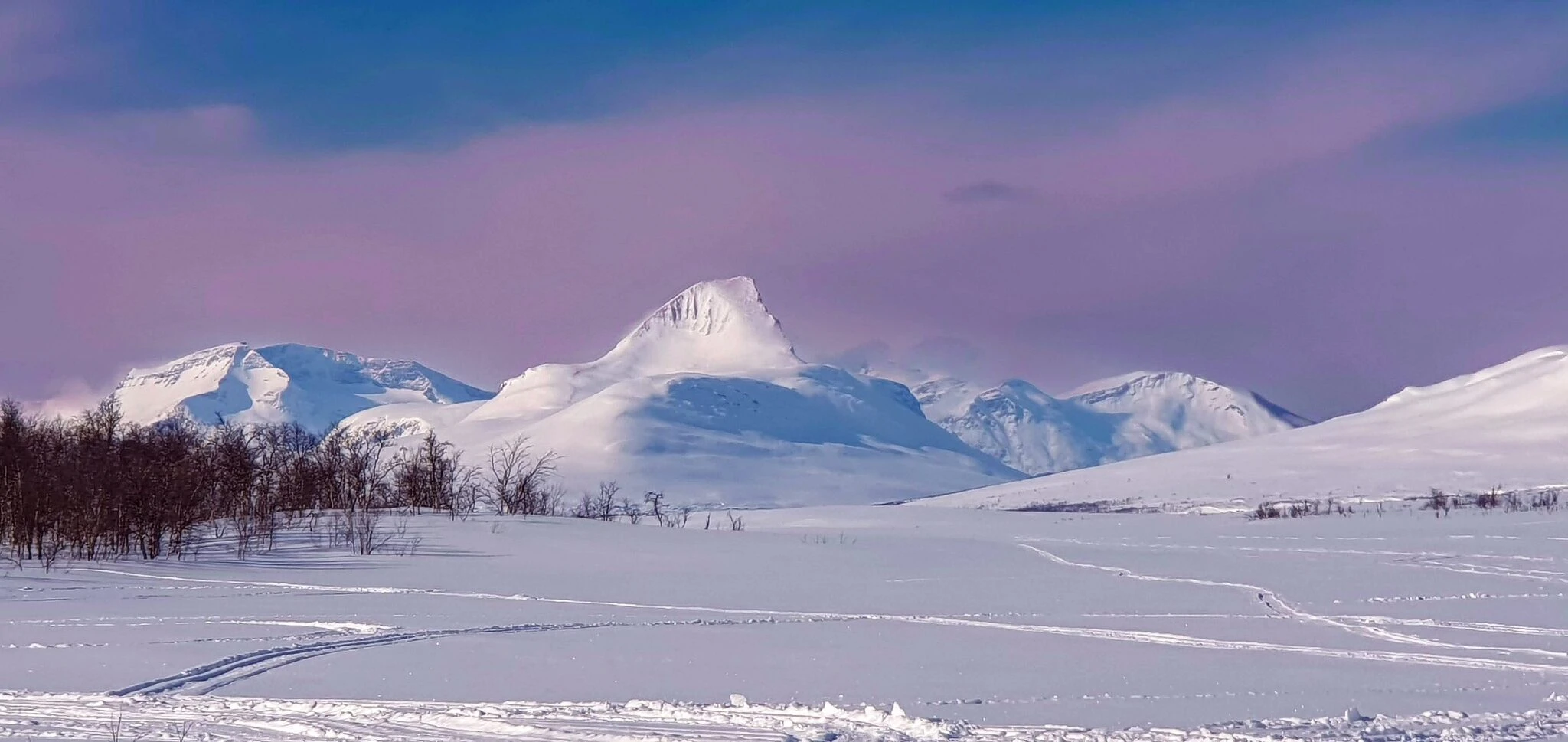 Snowmobile Sledge Journey to the Three-Country Cairn - A visit to